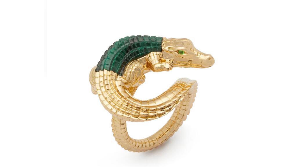 The 18-karat gold “Alligator Twist” ring by Bibi van der Velden with malachite scales and tsavorite eyes ($12,030) Bibi van der Velden alligator ring